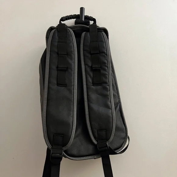 Vespa Black Backpack with multiple pockets, heavy duty zippers. Faux leather - Picture 2 of 14